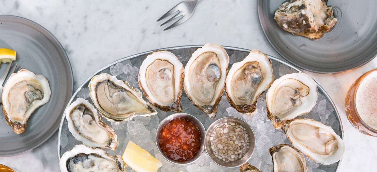 Oysters, lemons, ice beer